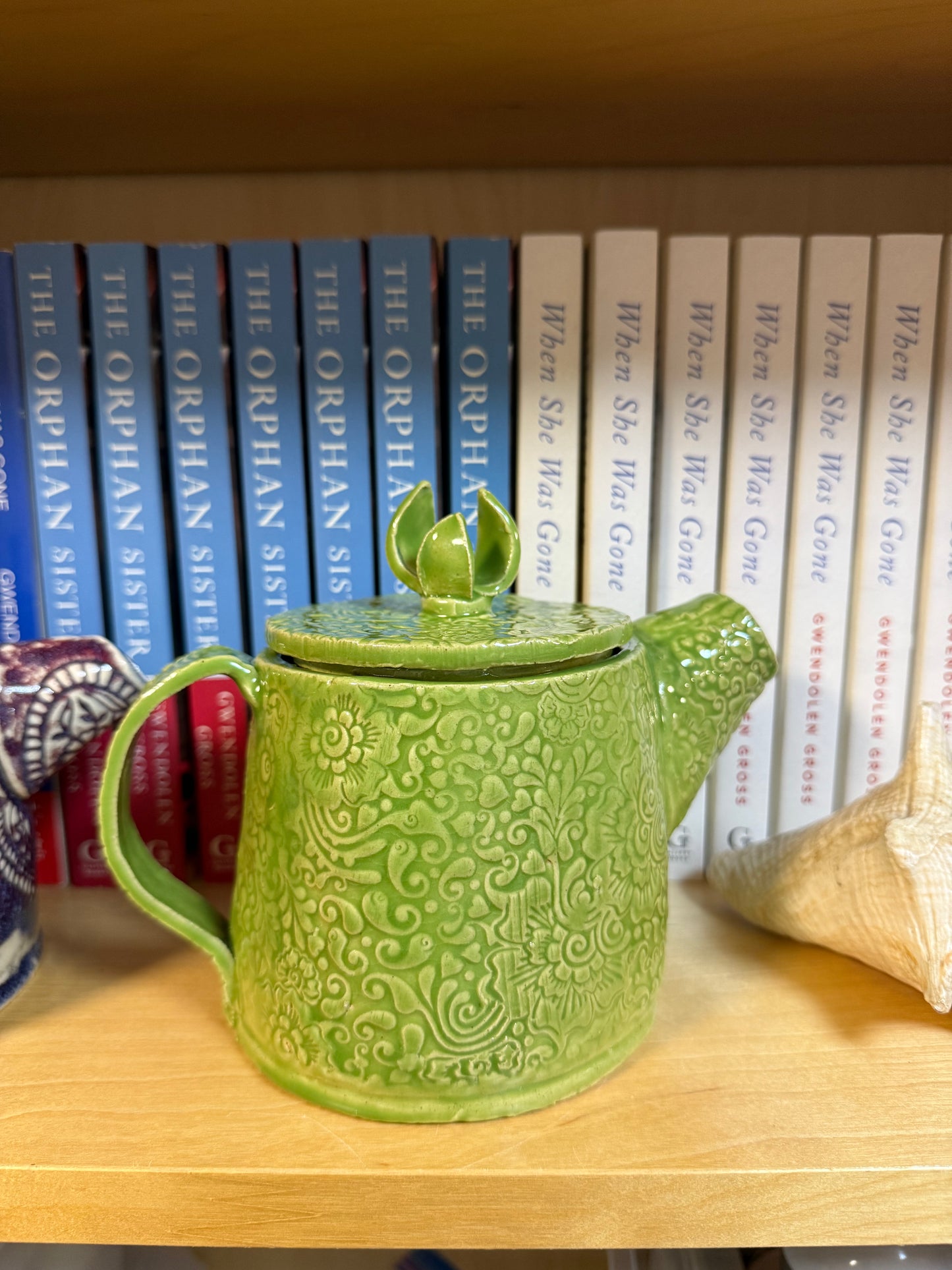 Chartreuse Green Teapot with Ornate Scrollwork Texture and Hand Sculpted Leaf Finial