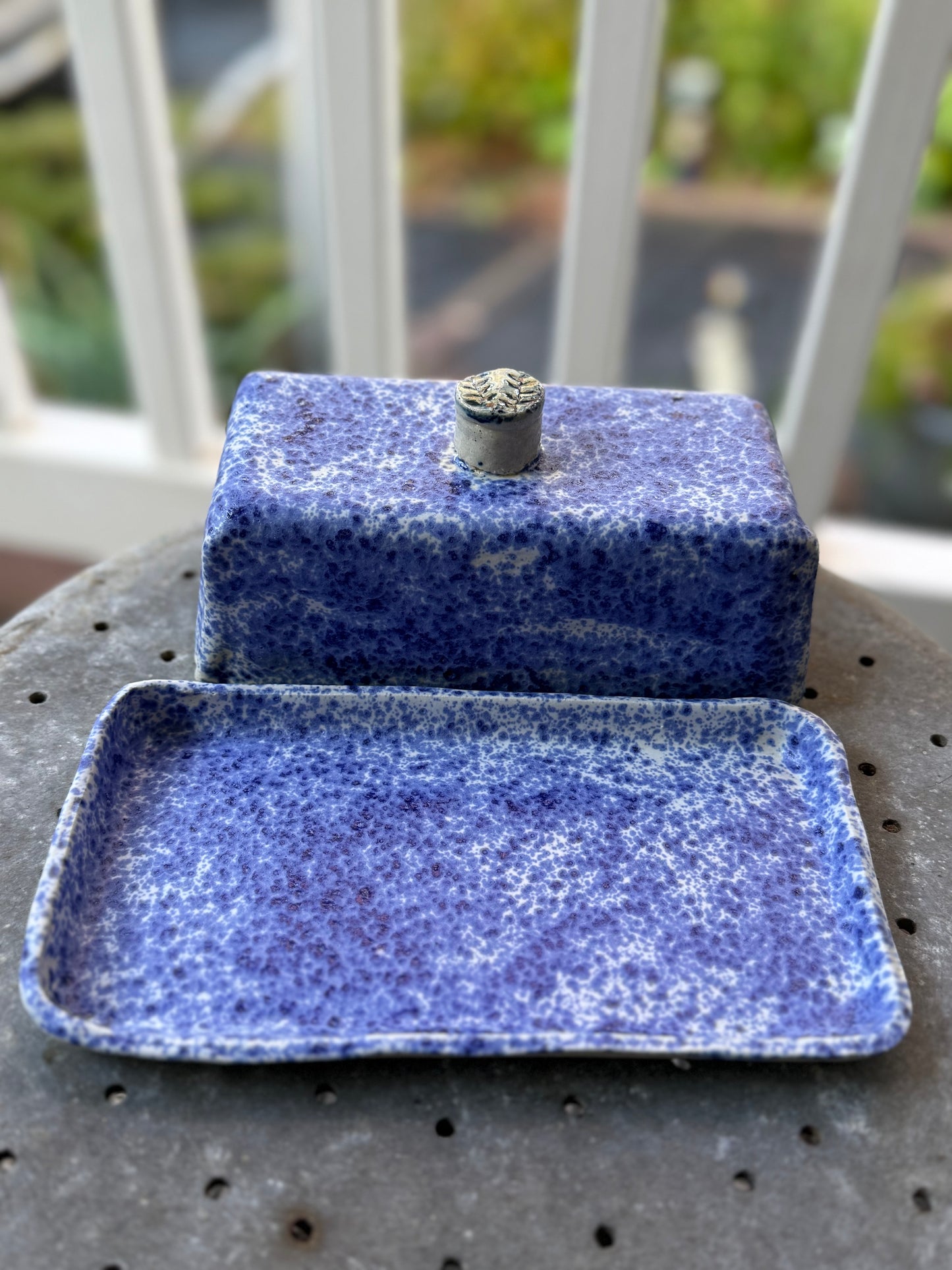 Handmade ceramic butter dish with blue freckles