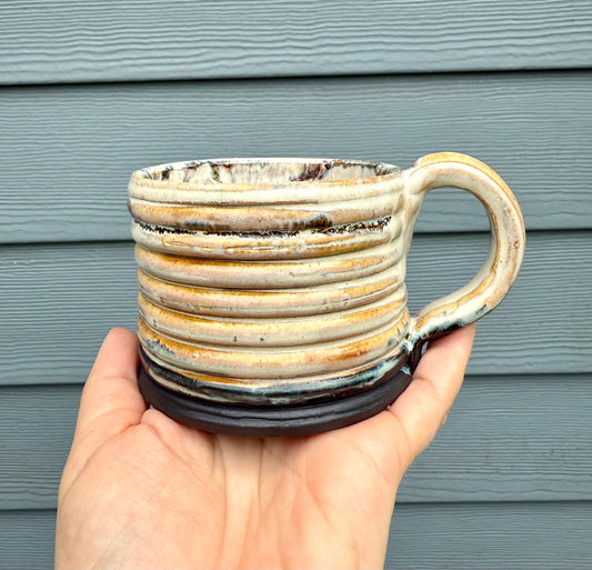 Mountain Ridges ceramic mug with birch and cordovan topographic inspired glazing
